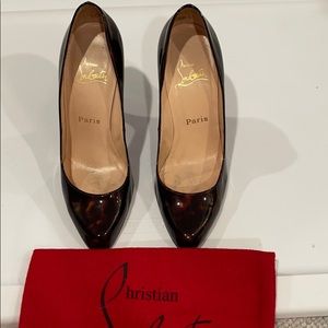 Christian Louboutin tortoise pumps
